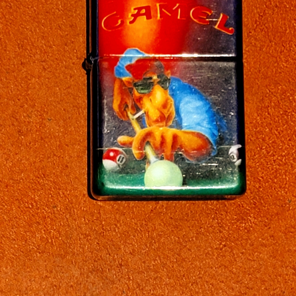 New (sealed) ©1993 RJRTC Camel Joe Shooting Pool Zippo Lighter